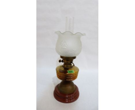 An early 20th century oil lamp with frosted glass shade and glass fount. 20'' high