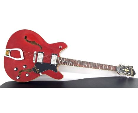 Hagstrom Viking hollow body electric guitar, cherry finish with some light surface marks, electrics in working order, Hiscox 