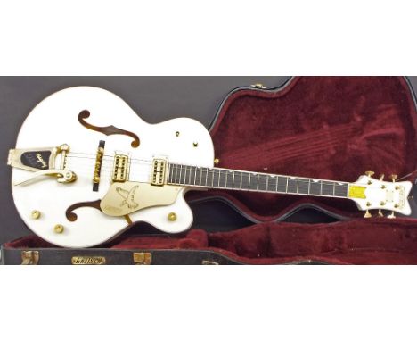 2013 Gretsch G6136T White Falcon hollow body electric guitar, made in Japan, ser. no. JT13xxxxx9, white finish with light sur