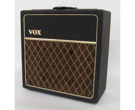 Small vintage guitar amplifier with "Vox" facelift