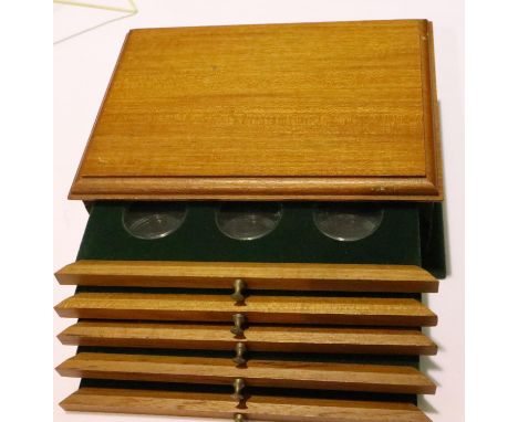 A five-drawer sectional coin collectors chest, each tray with six capsules (each D: 45 mm), overall 27 x 20 x 10 cm. P&amp;P 