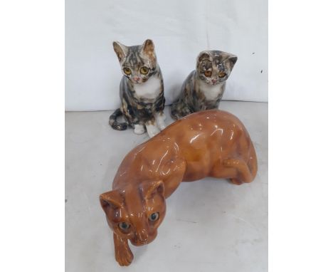 Three ceramic models of cats in the Winstanley style, all having glass eyes and two signed indistinctlyLocation: R1:2 