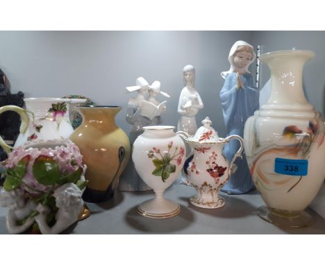 A Nao figure of a young girl praying, a small Coalport 'Hong Kong' twin handled urn with lid, a Herend vase 16cm h, a small m