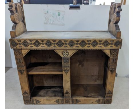 A 20th century carved wooden shelf with bird ornament Location: 