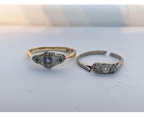 A 9ct gold and platinum sapphire and diamond ring 1.8g, together with a white metal three-stone diamond ring 1.7g Location: C