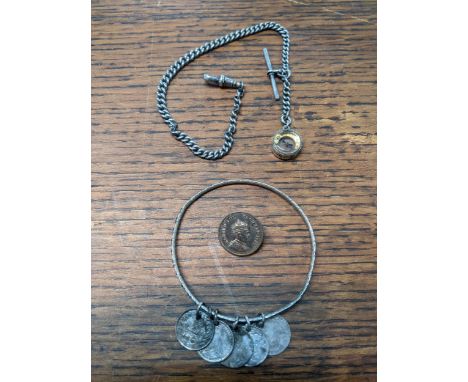 A silver watch chain with a silver collar compass, a coin brooch and braceletLocation: 