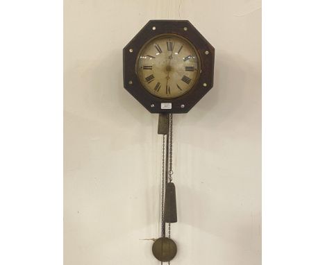 A Postman's alarm clock, circa 1840, the octagonal carved case with inlaid mother of pearl roundel's, the domed glass and spu