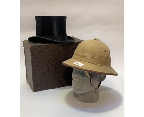 Gentleman's top hat in case by Woodrow Glasgow and a pith helmet of Spanish manufacture