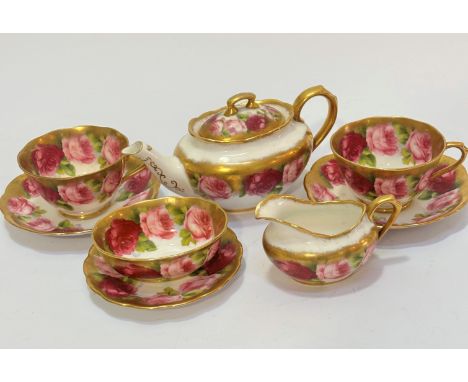 A Royal Albert china eight piece morning tea set including two cups, two saucers, milk jug, sugar basin and butter dish, all 