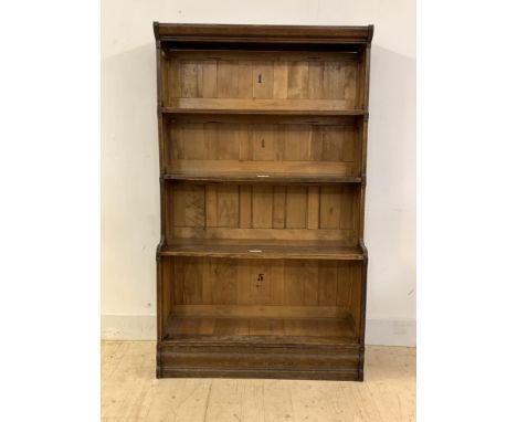 An Early 20th century Globe Wernicke style oak four height stacking open bookcase, with ivorine makers label inscribed Franci