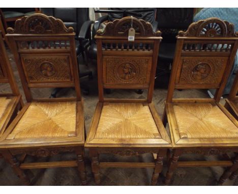 SEt of 6 Breton dining chairs with rush seats and carved panel backs 
