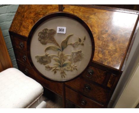 Early Victorian mahogany pole screen on tripod base with needlework panel 