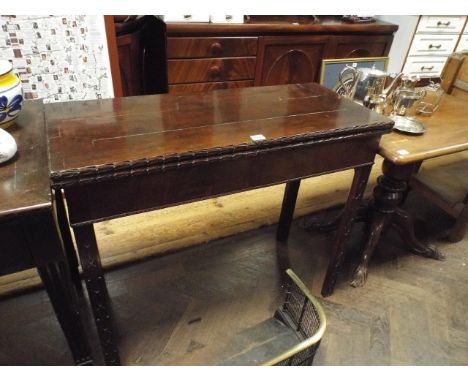 34" Georgian mahogany folding top card table with carved square chamfered legs  Condition -  one leg needs repair and small s