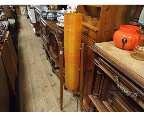 1960's tall teak floor standing lamp with orange shade