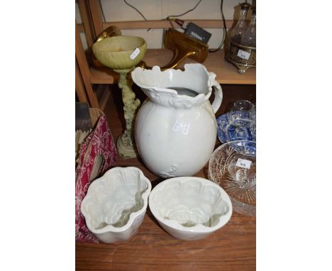 MIXED LOT: 2 CERAMIC JELLY MOULDS, WASH JUG AND A COMPOSITION PLANT STAND