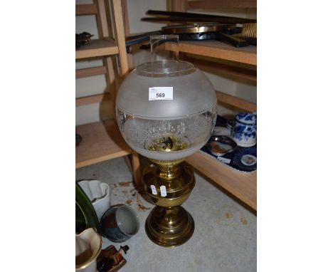 BRASS BASED OIL LAMP WITH FROSTED GLASS SHADE