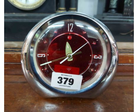 A vintage Diamond Brand chrome plated framed alarm clock with red dial