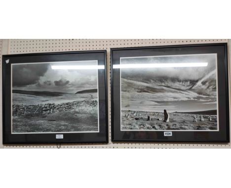 A pair of framed medium format monochrome photographs, one depicting standing stones, the other a dry stone wall with gate