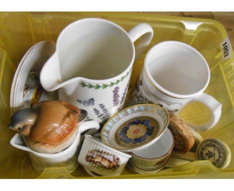 A small crate containing a quantity of ceramic items including Portmeirion Botanic Garden jug, pot lids, etc.