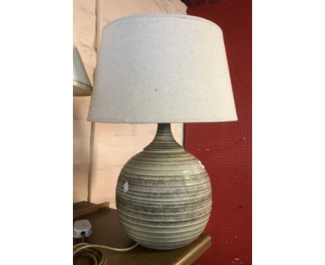 A KP Studio Pottery (Cornwall) table lamp of globe form with ribbed thrown line decoration with oatmeal glaze finish - sold w