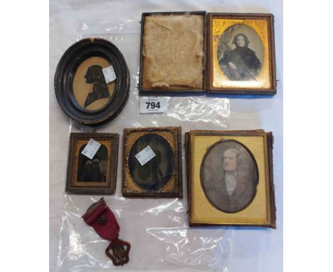 A bag containing four antique ambrotype and other early photographs - sold with a watercolour silhouette with gilt highlighti