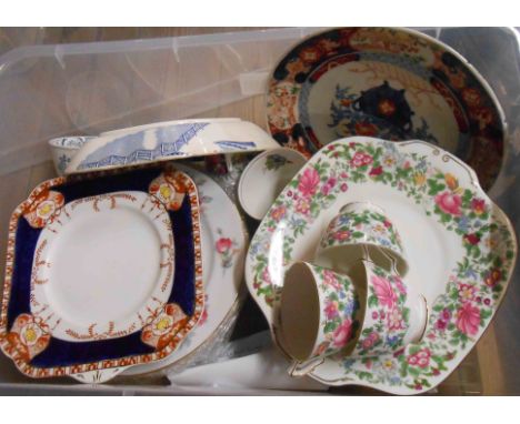 A crate containing a quantity of assorted ceramic items including Japanese Imari plate, etc.