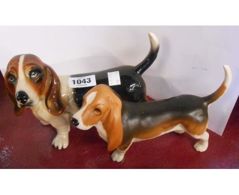 A Beswick model of a basset hound with semi matte glaze finish - sold with a larger unmarked similar