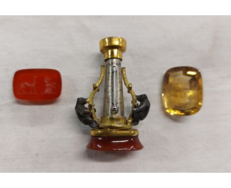 A Victorian fob seal of capstan form with central thermometer flanked by brass decorations depicting bears climbing tree bran