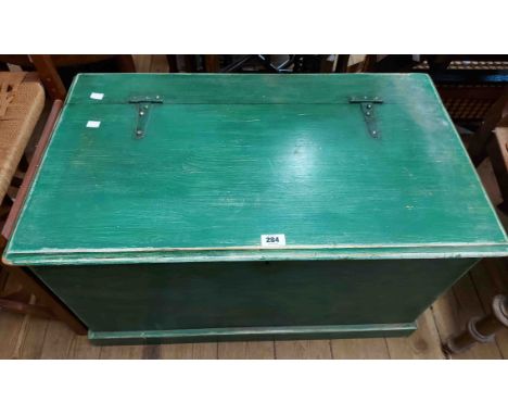 An 80cm green painted pine lift-top trunk - one handle missing