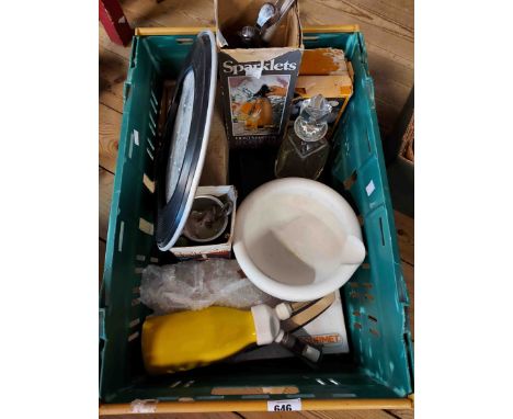 A crate containing a quantity of assorted collectable items including large ceramic mortar, vintage kitchen gadgets, Sparklet