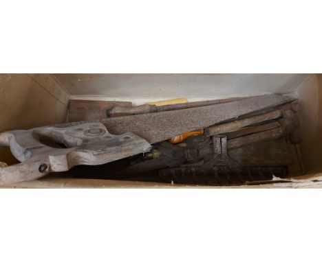 A box containing a quantity of assorted tools including saws, drills, etc.