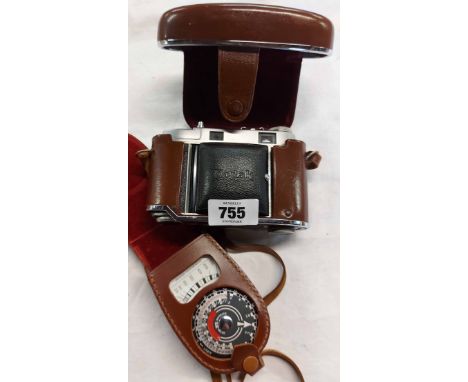 A vintage Kodak Retina camera in original leather case - sold with a light meter