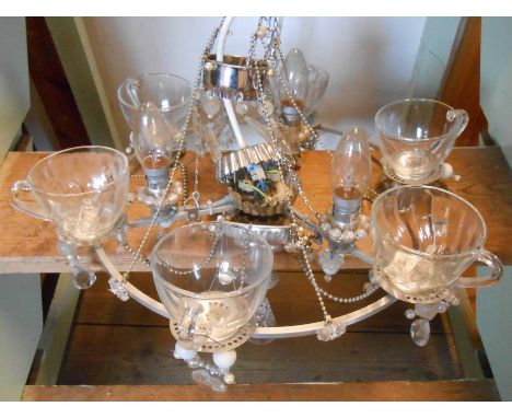 A modern three branch electrolier upcycled from household objects and glass lustre drops - sold with a modern gilt metal ceil