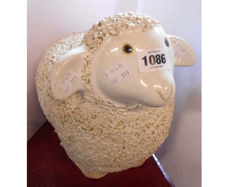 A large ceramic model depicting a lamb