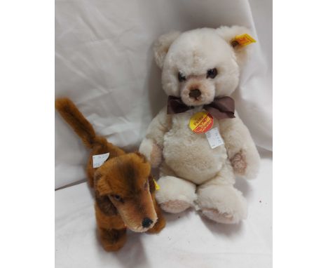 A Steiff teddy bear 'Petsy' with button to ear and original label - sold with a similar dachshund model 'Hexie'