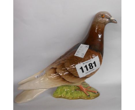 A Beswick pottery figurine depicting a pigeon in the brown colourway - model 1383