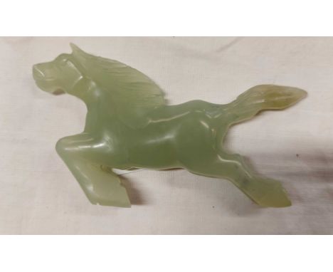 A 20th Century small carved Chinese jade horse