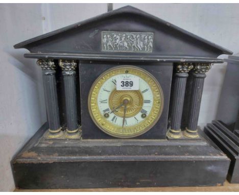 A late Victorian black painted metal mantel clock of architectural design with Ansonia gong striking movement - dial glass cr