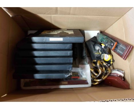 A box containing a quantity of assorted collectable items including model trains, Atlas Edition mini trains set, etc.