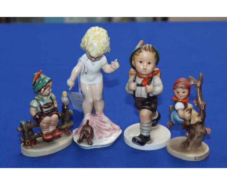 GOEBEL FIGURE MODELLED AS A YOUNG GIRL WITH PUPPY
printed marks and impressed GF161; together with three other Goebel figures