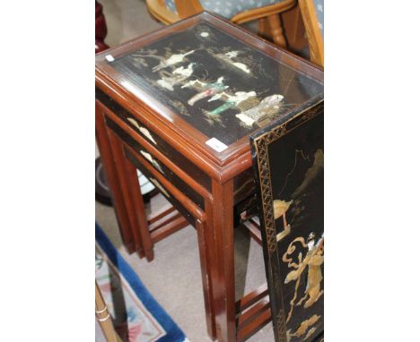 MODERN NEST OF CHINESE OCCASIONAL TABLES 
and an upright panel
