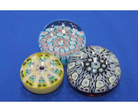 GROUP OF FOUR CAITHNESS GLASS PAPERWEIGHTS
of varying sizes, including one with original cardboard box 