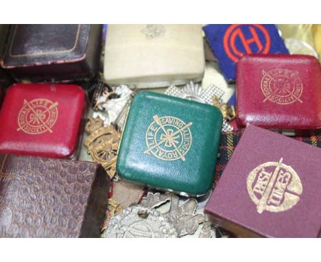 LOT OF CAP BADGES, 9CT GOLD CUFFLINKS, UNIFORM PATCHES
in a tin box