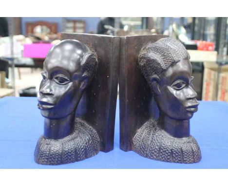LOT OF CARVED AFRICAN COLLECTABLES
including a pair of bookends, portrait busts, etc 