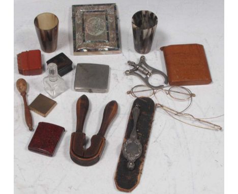 A treen nut cracker, 2 gilt spectacles, mother of pearl card case, etc