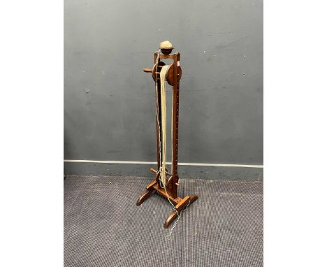 A fruitwood floor standing wool winder, late 19th century, 106cm high; a nest of 3 oak tables on bobbin turned legs and a can