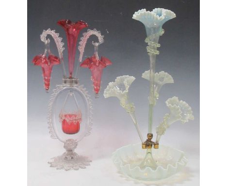 A Victorian four branch epergne with white opalescent glass frilled elements together with a white moulded glass and cranberr
