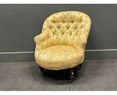 A late 19th century low button back armchair70 x 60 x 80cm
