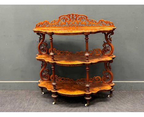 A Victorian three tier walnut buffet113 x 106 x 39cmstructurally ok with a bit of movementtop very scratched and indented Top