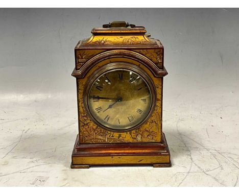 An Edwardian mantel clock, with red and gilt japanned case, French movement, 20cm high